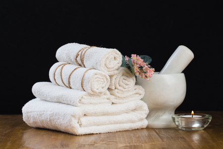Spa still life with aromatic candles and towel. - Imageの写真素材