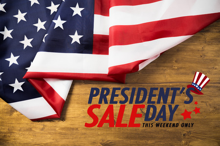 Flag of United States on a wooden table backgroundの写真素材