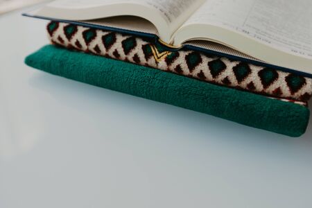 Islamic concept - The holy Quran on a praying matt