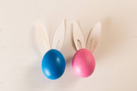 easter eggs on white wooden background