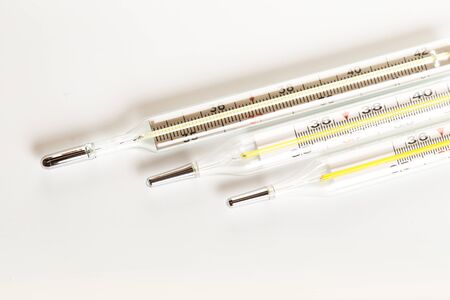 mercury thermometers on white background close up view- Image
