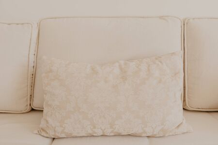 beige sofa with pillows in living room - Imageの写真素材