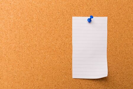 Cork board with pinned colored blank notes - Imageの写真素材
