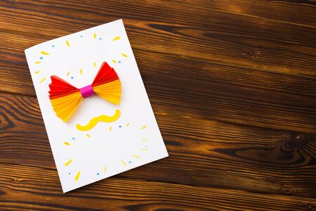 Happy fathers day sign on paper  laid on wooden floor backround. - Imageの写真素材