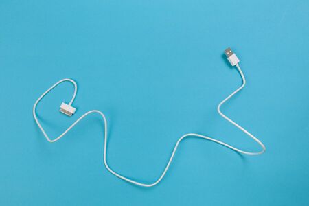 USB Micro cables ob blue background. Connectors and sockets for PC and mobile devicesの写真素材