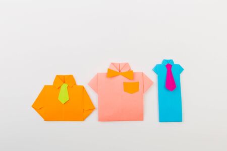 Happy fathers day sign on paper shirts   laid on white backround. - Imageの写真素材