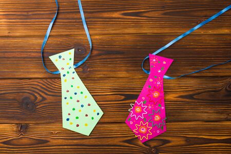 Happy fathers day sign on paper  laid on wooden floor backround. - Imageの写真素材