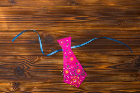 Happy fathers day sign on paper  laid on wooden floor backround. - Imageの写真素材