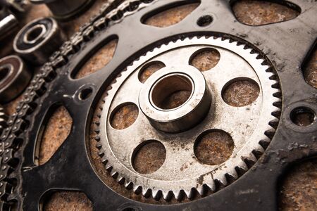 Various car parts and accessories, on metal  background