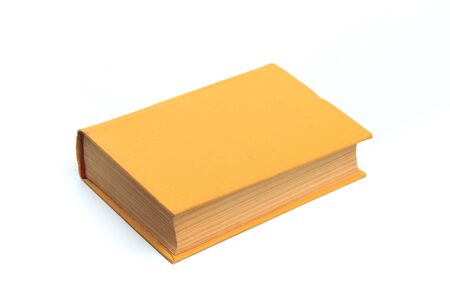 Closed yellow book isolated on a white background -Imageの写真素材