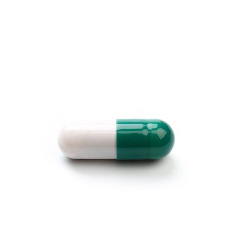 Capsule, pill on white background - isolated. Drug for health care. Biological food additives....