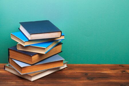 pile of old books, panorma, good copy space  on blue background - Imageの写真素材