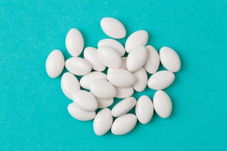 white  tablets on blue  background - Image