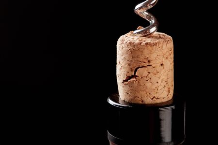 Bottle opener close-up, on dark  background - Imageの写真素材