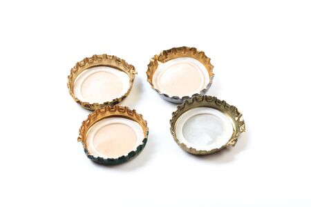 bottle caps on white background isolatedの写真素材