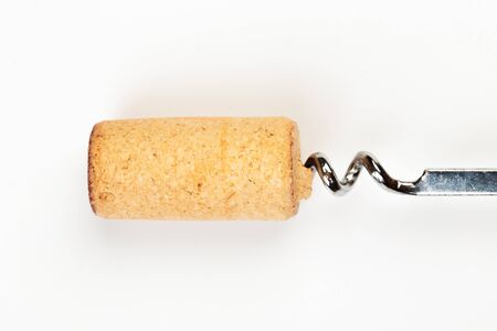 corkscrew and wine cork isolated on white backgroundの写真素材