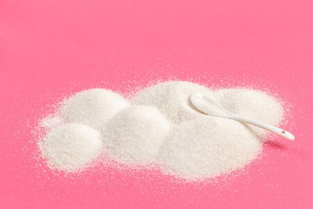 Heaps of sugar on pastel background - Imageの写真素材