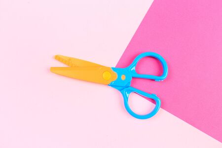 Minimal concept for scissor  on pink background