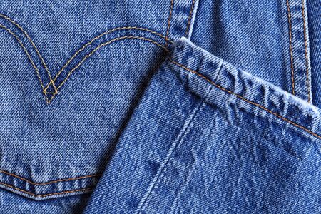 Denim jeans texture or denim jeans background with old torn.