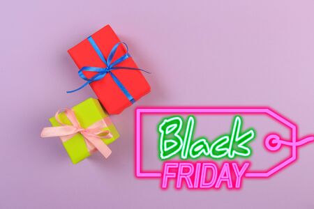 Different colored gift box on color background. Top view of various present boxes on minimal background. Birthday, Christmas, wedding, valentine, romantic giftsの写真素材