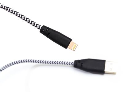 Charger for smartphone or tablet computer isolated on white background