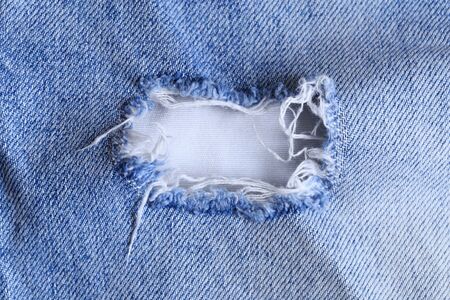 Denim jeans texture or denim jeans background with old torn.