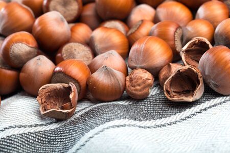 close up of hazelnuts on table - Image 