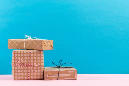 Collection of Christmas present boxes on a light blue background