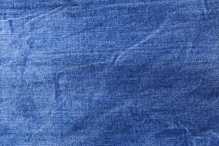 Retro color tone of blue denim jeans fabric texture for background website fashion design or...