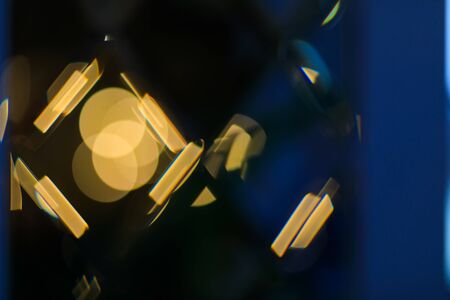 Abstract Golden glare on abstract bokeh background