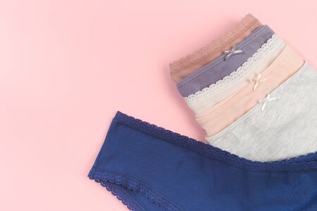Female panties over pink  background