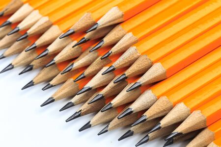 Bunch of yellow pencils isolated on white