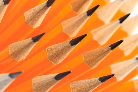Bunch of yellow pencils isolated on whiteの写真素材