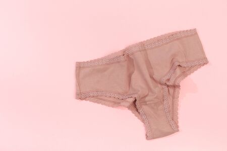 Female panties over pink  backgroundの写真素材