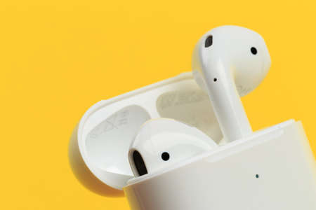 Apple AirPods - wireless bluetooth earphones or headphones and white box for storage and charging,...