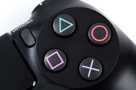 Russia, OKTOBER 24 2019: PS4 console background. Playstation 4 controllers. Sony gaming consoleのeditorial素材