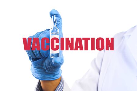 doctor holding a vaccine on white background . vaccination conceptの写真素材