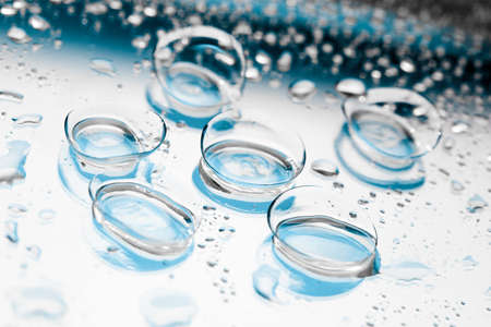 contact lenses with droplets around close up viewの写真素材
