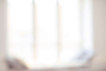 blurred background with window and sill in light colors
