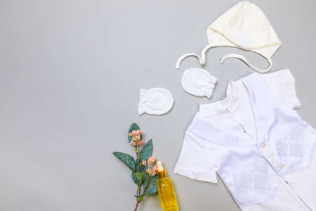 Baby concept. Baby cloth and goods on grey  background. Place for text. View from above. Flat Layの写真素材