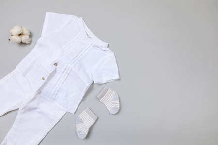 Baby concept. Baby cloth and goods on grey  background. Place for text. View from above. Flat Layの写真素材