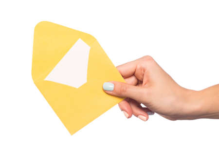 female hand holding  envelope isolated on white background - Imageの写真素材