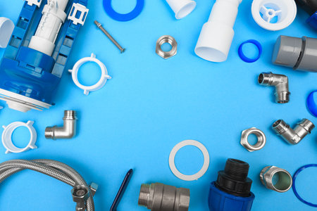 Details siphon kitchen sink on blue  backgroundの写真素材