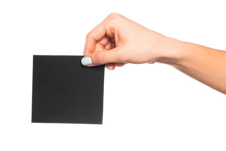 female hand isolated on white background holding card  with text placeの写真素材