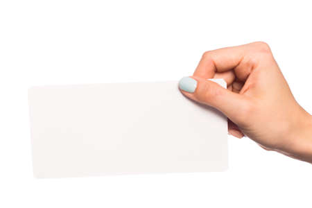 female hand isolated on white background holding card  with text placeの写真素材
