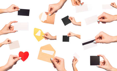 set of   female  hands  holding cards for mock up isolated on white backgroundの写真素材