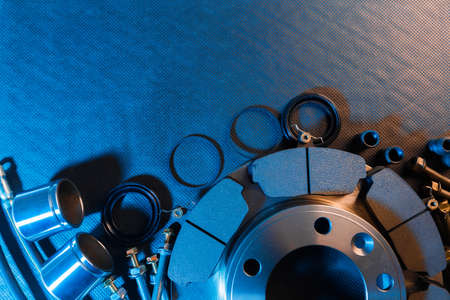 brake parts on dark background  brake pads, disc, brake hose, guides, cylindersの写真素材