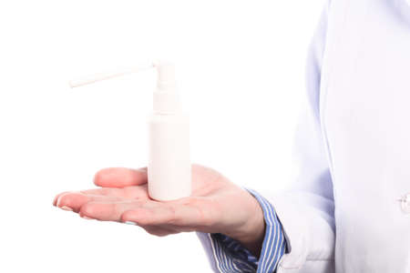 Doctor hand in sterile gloves holding spray  isolated on white backgroundの写真素材