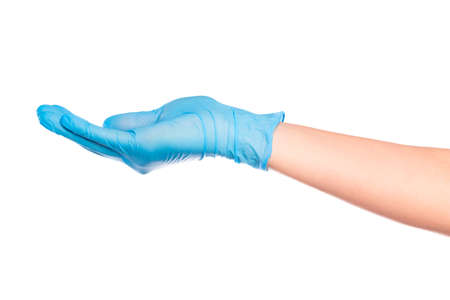 female hand in sterile gloves isolated on white background showing hand gesturesの写真素材