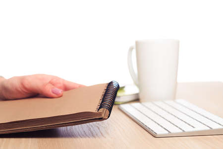 female hands write in a notebook . Office placeの写真素材